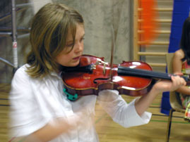 girl playing a violin
