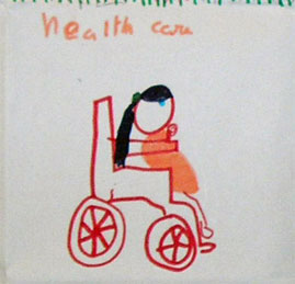 child in a wheel chair